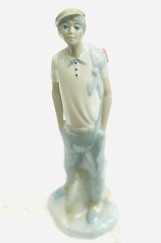 Boy with Cap & Slung Bag – Ceramic Figurine in the Style of Nao | Unmarked Collectible Ornament
