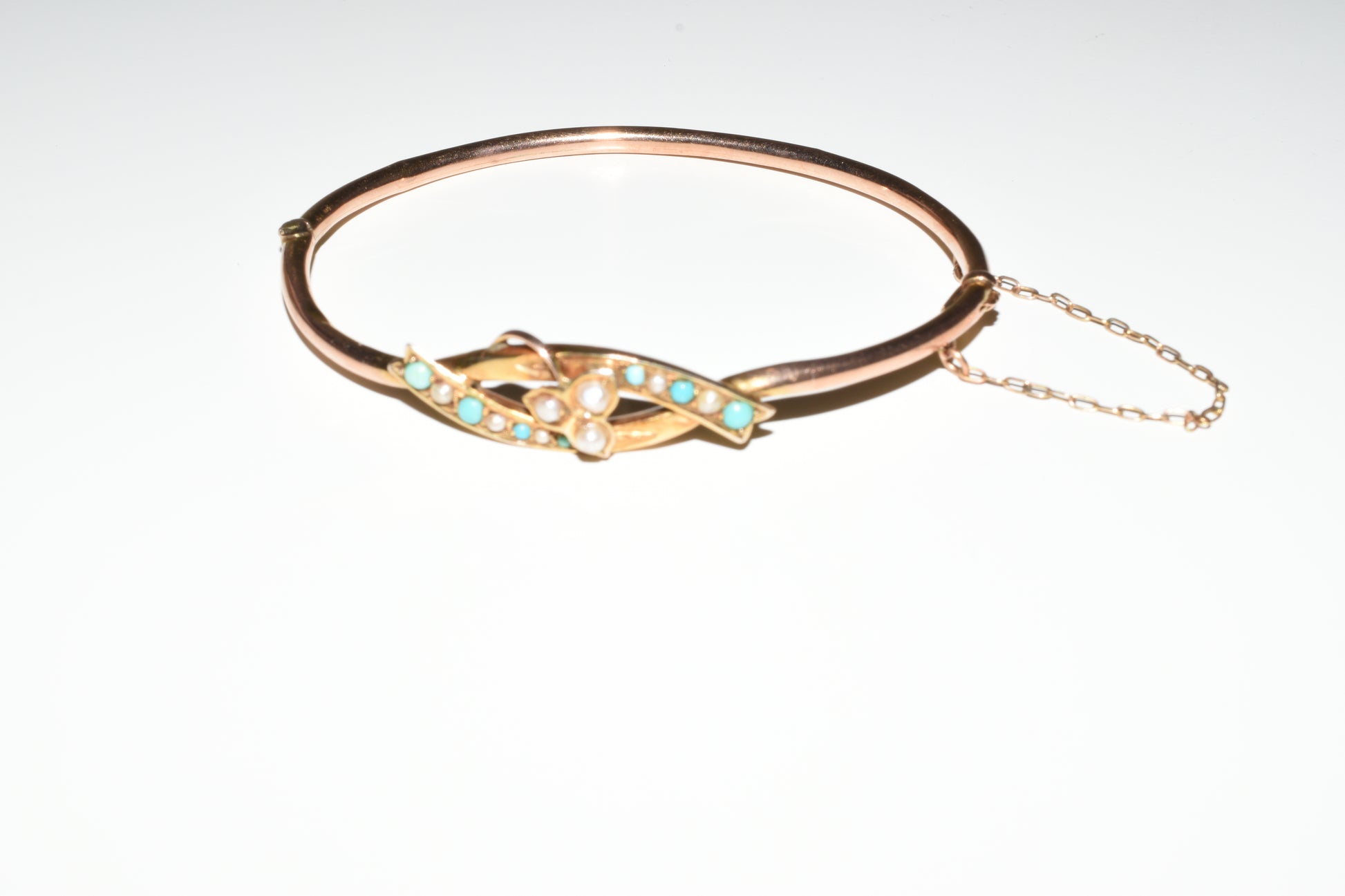 Ladies Gold Jewellery - An Edwardian 9ct Gold Bangle with Turquoise Stones and Seed Pearls 