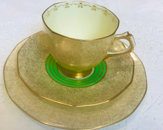 Toskanisches Teetassen- und Untertassen-Set in Grün und Gold