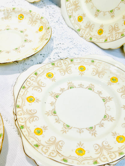 Mismatched vintage yellow tea set, perfect for an afternoon tea. Includes beautiful pieces by Tuscan and Royal Grafton China