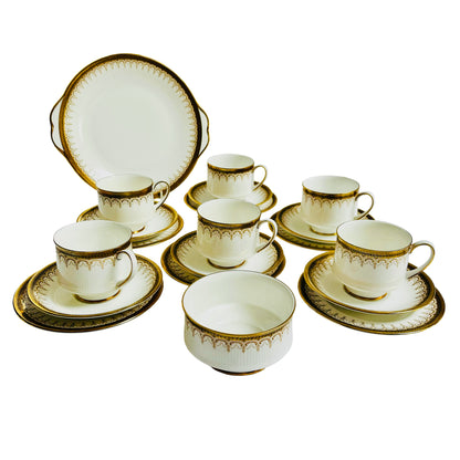 Vintage Paragon Athena tea set in white bone china with gold trim, featuring teacups, saucers, and plates in a classic 1950s English design.
