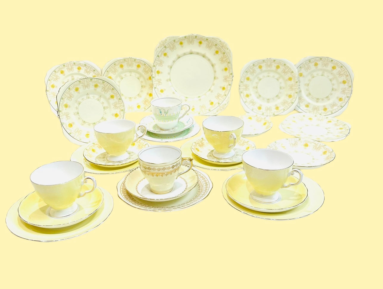 Mismatched vintage yellow tea set, perfect for an afternoon tea. Includes beautiful pieces by Tuscan and Royal Grafton China