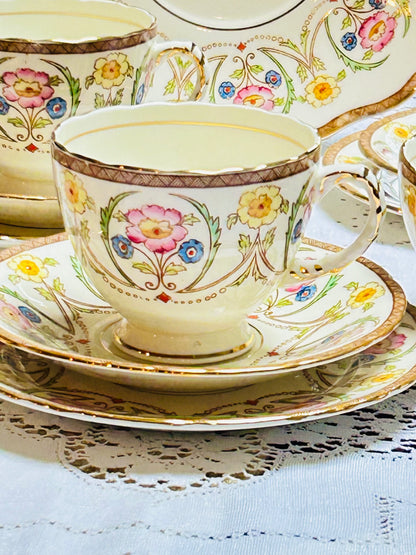 This 21-piece vintage floral tea set from Sutherland China is a charming addition to any tea lover’s collection. Made in England, each piece features delicate hand-painted flowers and fine bone china craftsmanship.