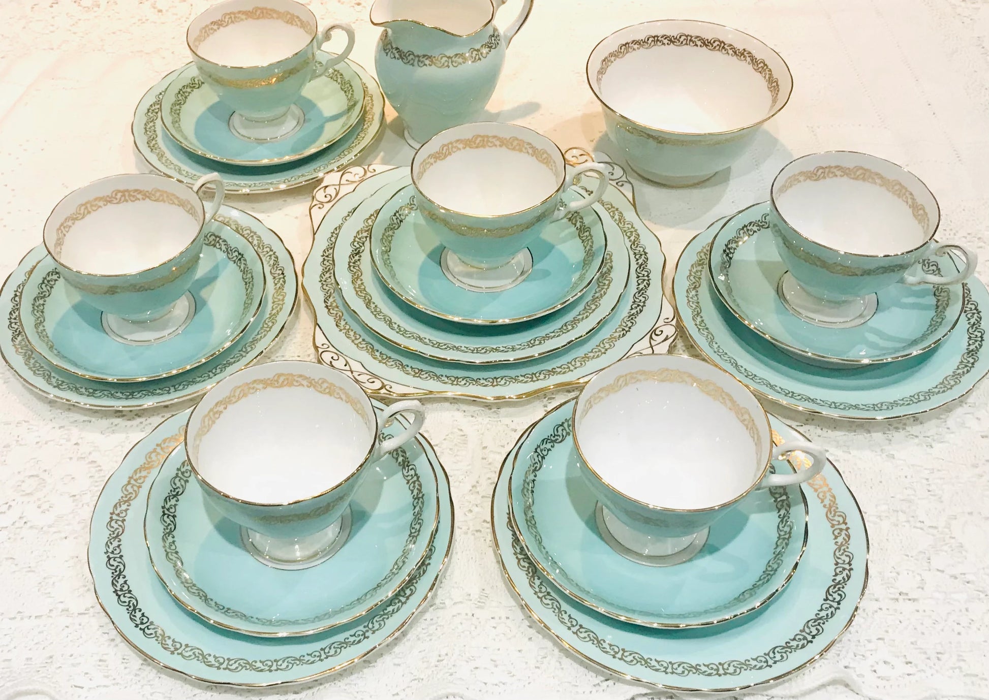 A gorgeous duck/robin egg blue vintage English bone china tea set for 6 people.