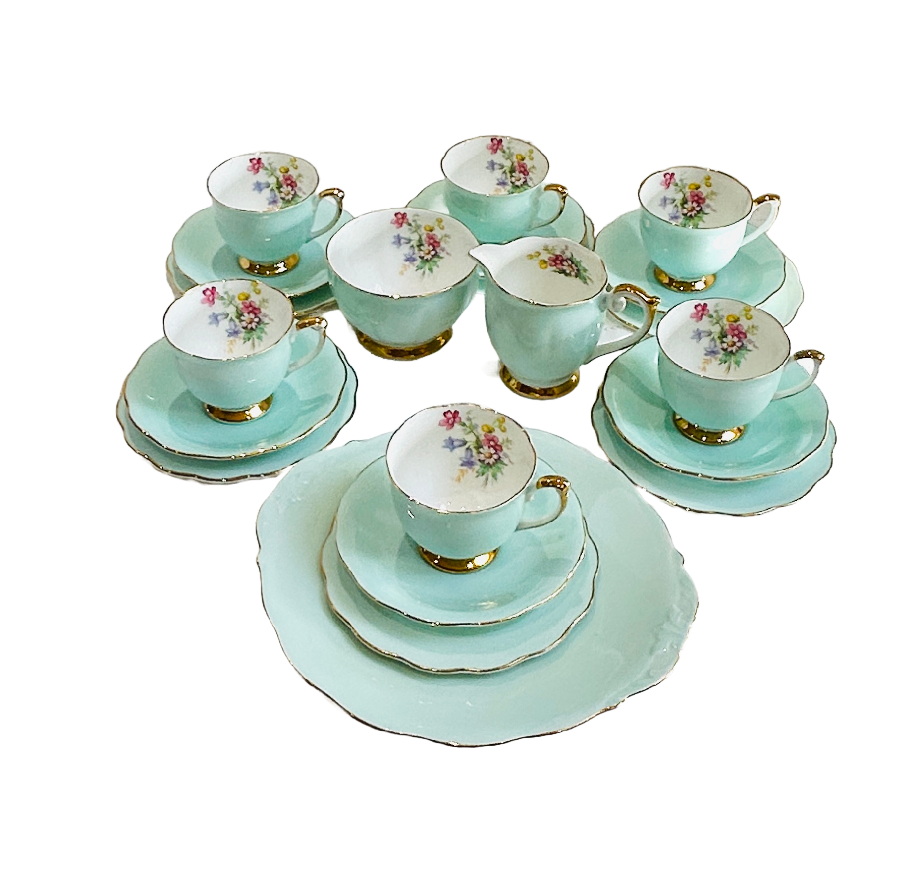 This elegant vintage Queen Anne &nbsp;China tea set from England features a delicate pink rose mix bouquet design. &nbsp; The colour is a beautiful timeless robin/duck egg blue, with a fine gold trim and a colourful bouquet spray of flowers inside the cups, 