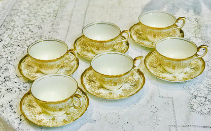 A set of 6 Gold & White Teacups & Saucers by Crown Staffordshire - Vine Pattern